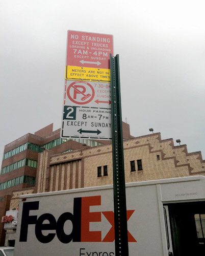 What a load! City switches out confusing street sign, but hated loading zone stays