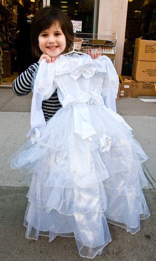 Cops and brides are Purim’s hottest costumes