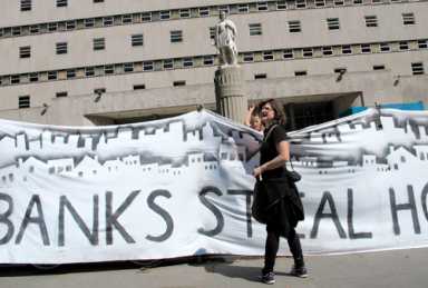 Occupiers occupy court to interrupt foreclosure auctions