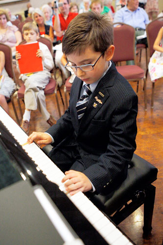 Piano students bring down the house at senior citizen home