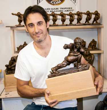 Lazy man’s Heisman: Gowanus sculptor molds fantasy sports trophies