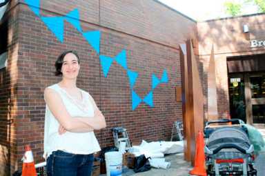 Mural makeover! New artwork wraps around Cortelyou Library