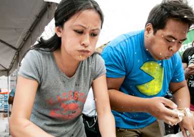 Foodies devour semi-fertilized duck eggs in Downtown eating contest