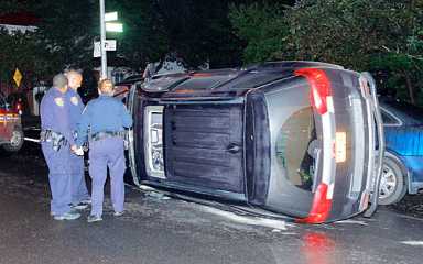 Driver flips minivan on Ave. I