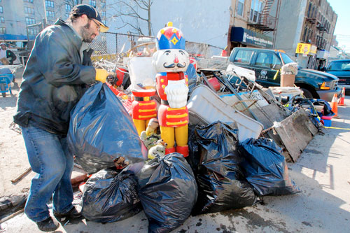 Picking up the pieces — volunteers help clean out Mermaid Avenue green space