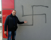 Vandal hits car wash with swastika during Hurricane Sandy