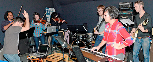 They score! Band plays music over films