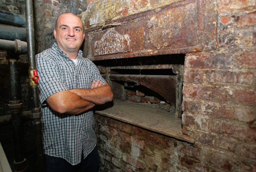 Hot find! Pizza maker discovers coal oven in his basement