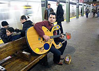 Sing us a song, you’re the weird guitar man