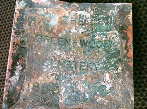 Green-Wood time capsule yeilds soggy stash