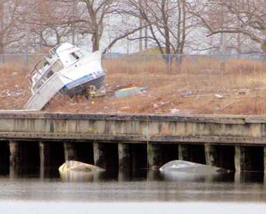 Stranded boat falls through the cracks