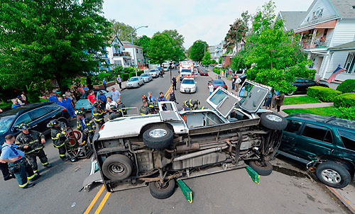 Woman trapped for 20 minutes of terror in flipped over ambulance