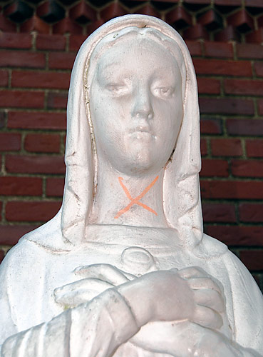 Church statues defaced