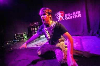 Wannabe rock gods perform in air guitar competition