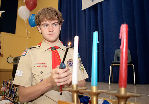 Pinning the wings on Eagle Scout.