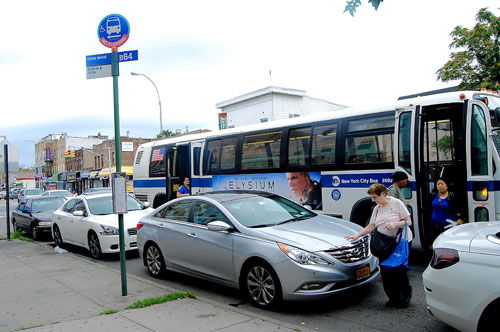 Above the law! Cops’ cars block bus stops and hydrants with impunity