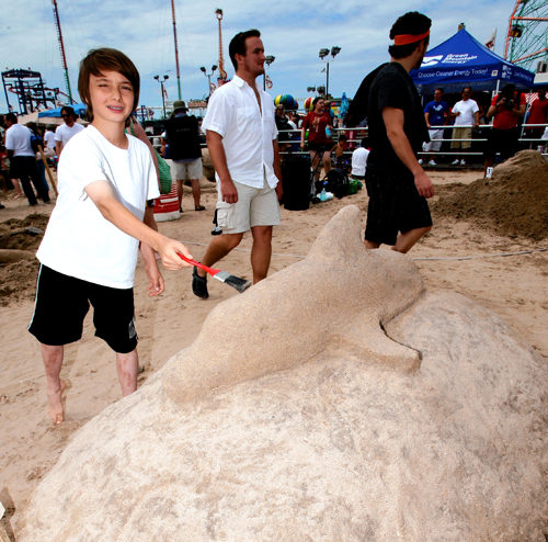 Artists take to the beach to show off their sand-molding skills