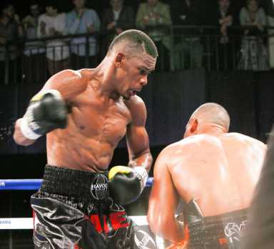 Cancer survivor Jacobs drops veteran Lorenzo to win middleweight title