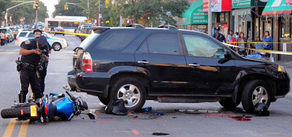 Biker and driver collide on Third Avenue