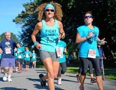 Thousands fight ovarian cancer through annual awareness walk and run