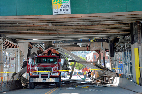 Heads up! Smith-Ninth subway station scaffolding falls onto dump truck, backing up train and car traffic