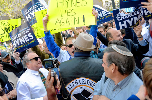Protestors kick Hynes rally