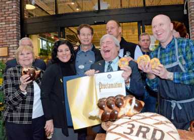 Whole-hearted embrace at Whole Foods’ first day — almost