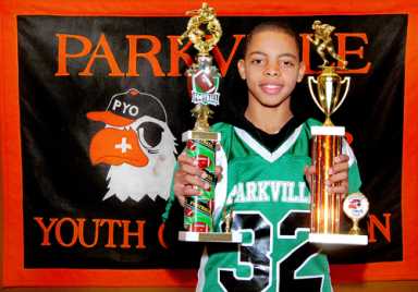 In the endzone! Kid football players wrap up season