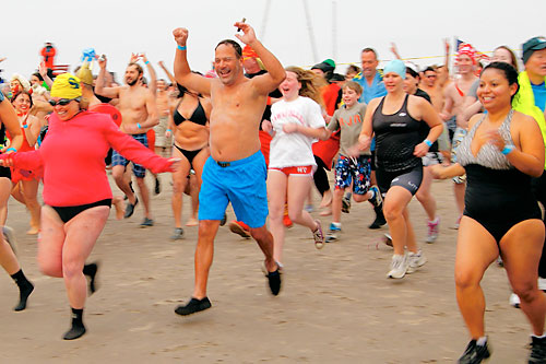 Cold acquaintance! Polar Bear Club holds annual New Year’s Day plunge
