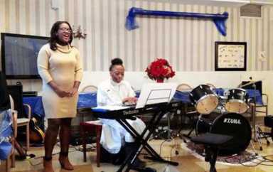 Performing arts students add Christmas Cheer to nursing home seniors