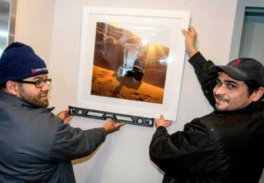 Getting milit-art! Landlord to decorate with pics by veterans