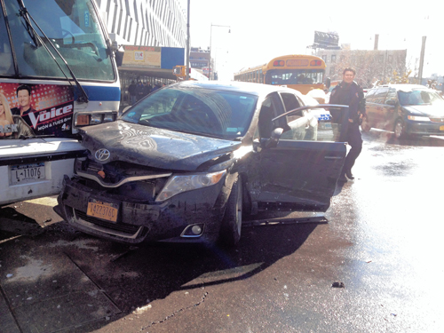 Bus, livery-cab crash bangs up straphangers at busy Downtown corner
