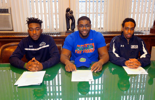 Lincoln football stars make college choices offical