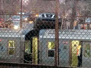 Arrest in crash that left SUV atop Q train