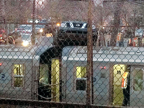 Arrest in crash that left SUV atop Q train