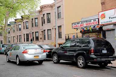 Car wars! Ridgites say livery cabs are taking over block
