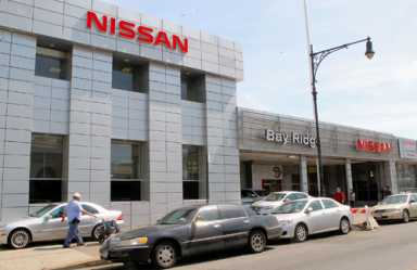 Auto dealer forced to pay nearly $100,000