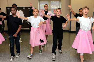 Students and seniors sing and shimmy through ‘Grease’