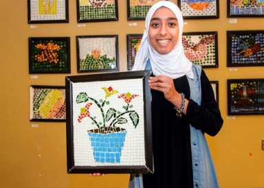 Islamic school’s motto: We love to see you tile