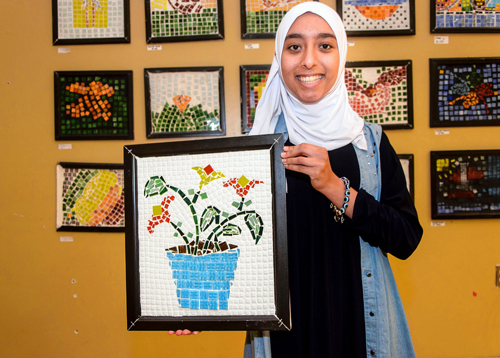 Islamic school’s motto: We love to see you tile