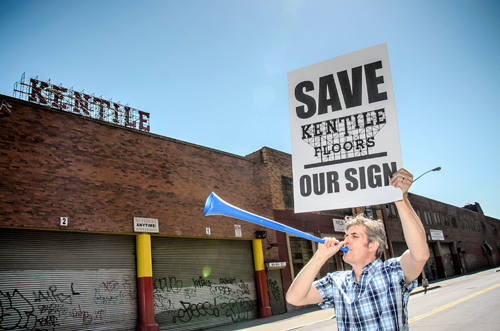 Floors wars! Residents battle to preserve Kentile sign