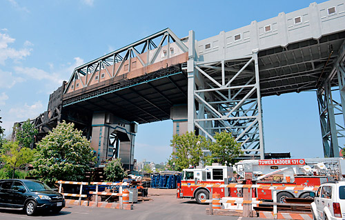 Ouch! Scaffolding plummets several stories onto worker