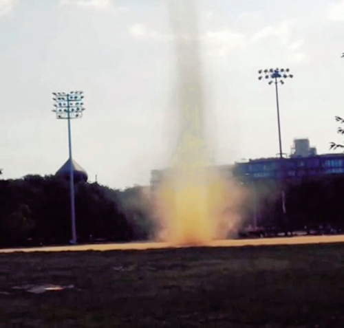 Twister and shout! McCarren Park wigs out over dust devil