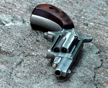 Finger-pointing follows pistol-pointing, shooting Downtown