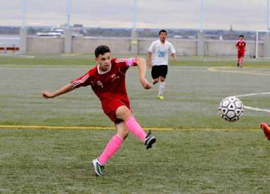 Cougars take firm grip on first place with victory over Brooklyn International