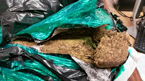 Cops find 37 pounds of pot left on street
