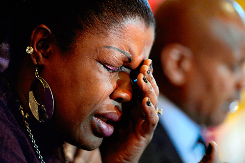 Parents mourn stairwell-shooting victim, DA investigates