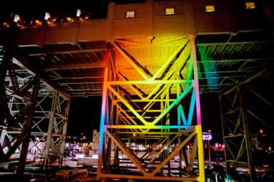 In rumbling color: Gowanus subway tracks backdrop of light show