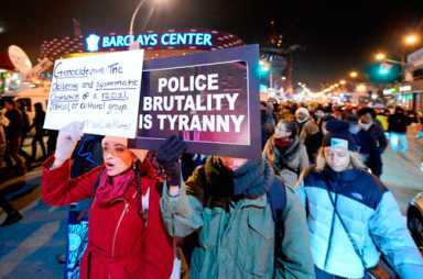 Garner protesters greet royals at Barclays Center