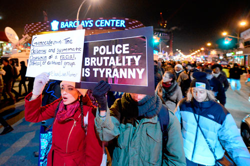 Garner protesters greet royals at Barclays Center